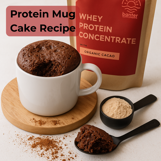 Chocolate protein mug cake made with Banter whey protein concentrate, served in a white mug with whey powder and cocoa on the side.